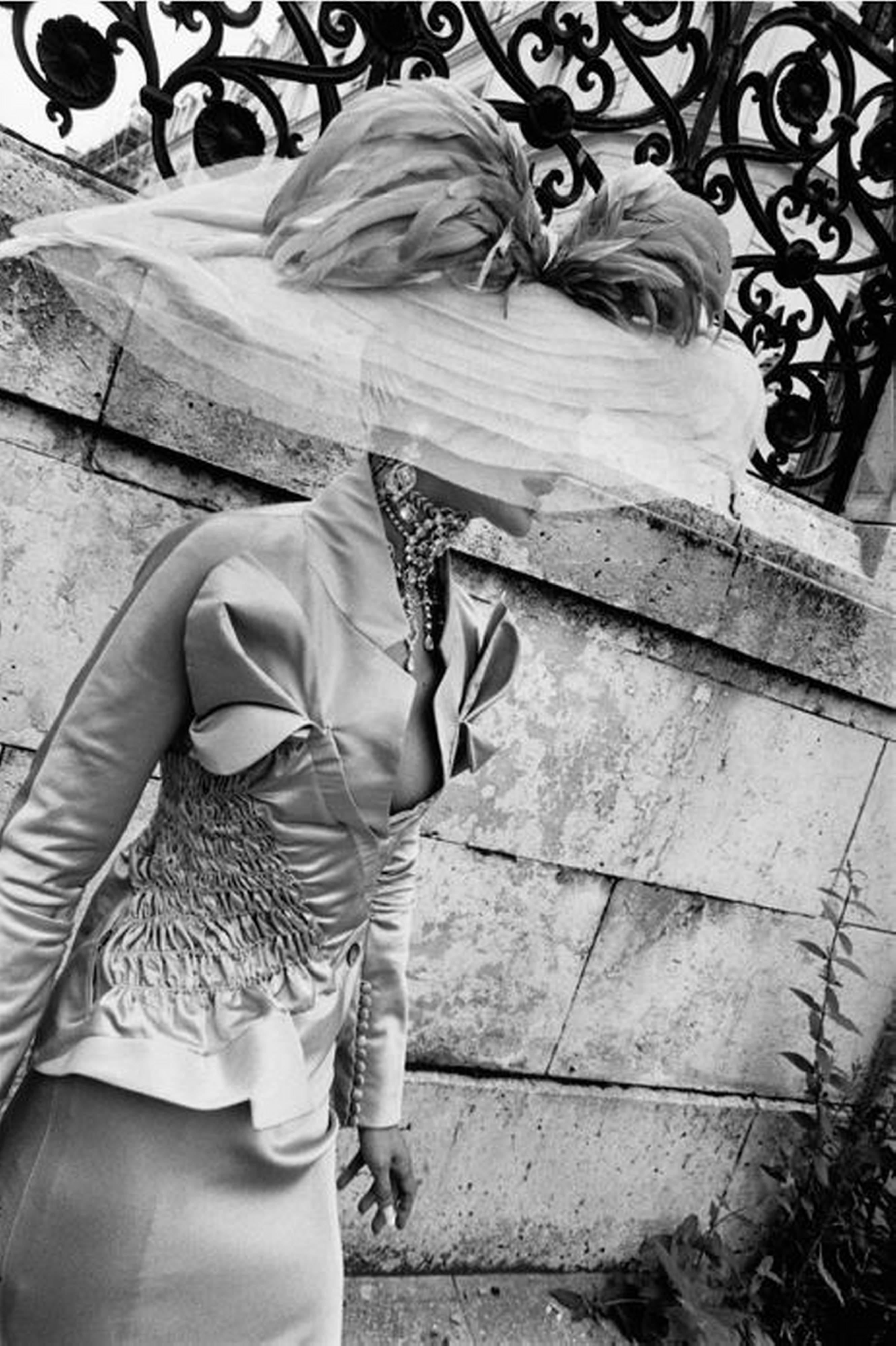 Gérard Uféras Black and White Photograph - Christian Dior Haute Couture Paris, woman with feather hat