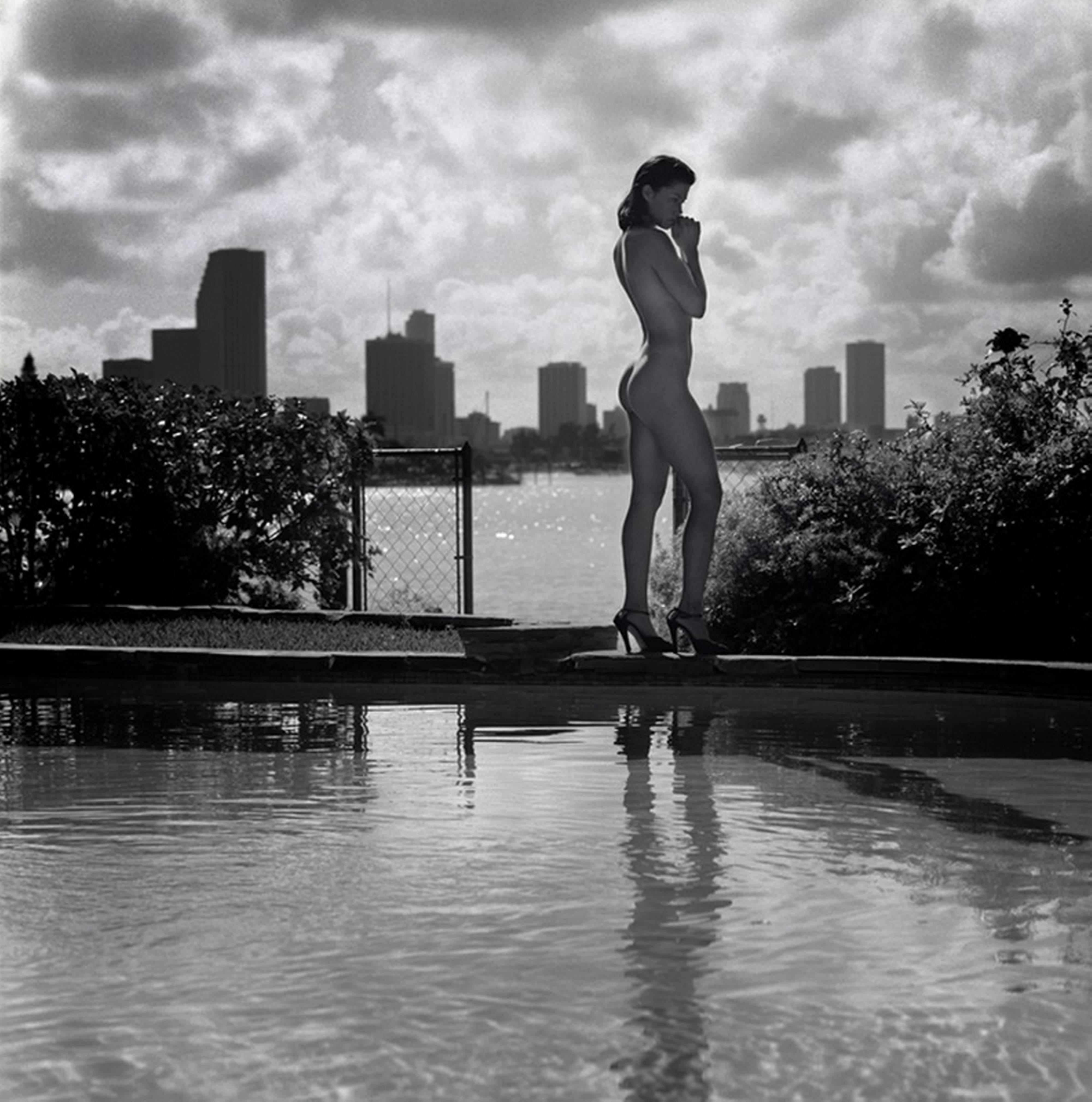 Guido Argentini Black and White Photograph - Kim under a cloudy sky