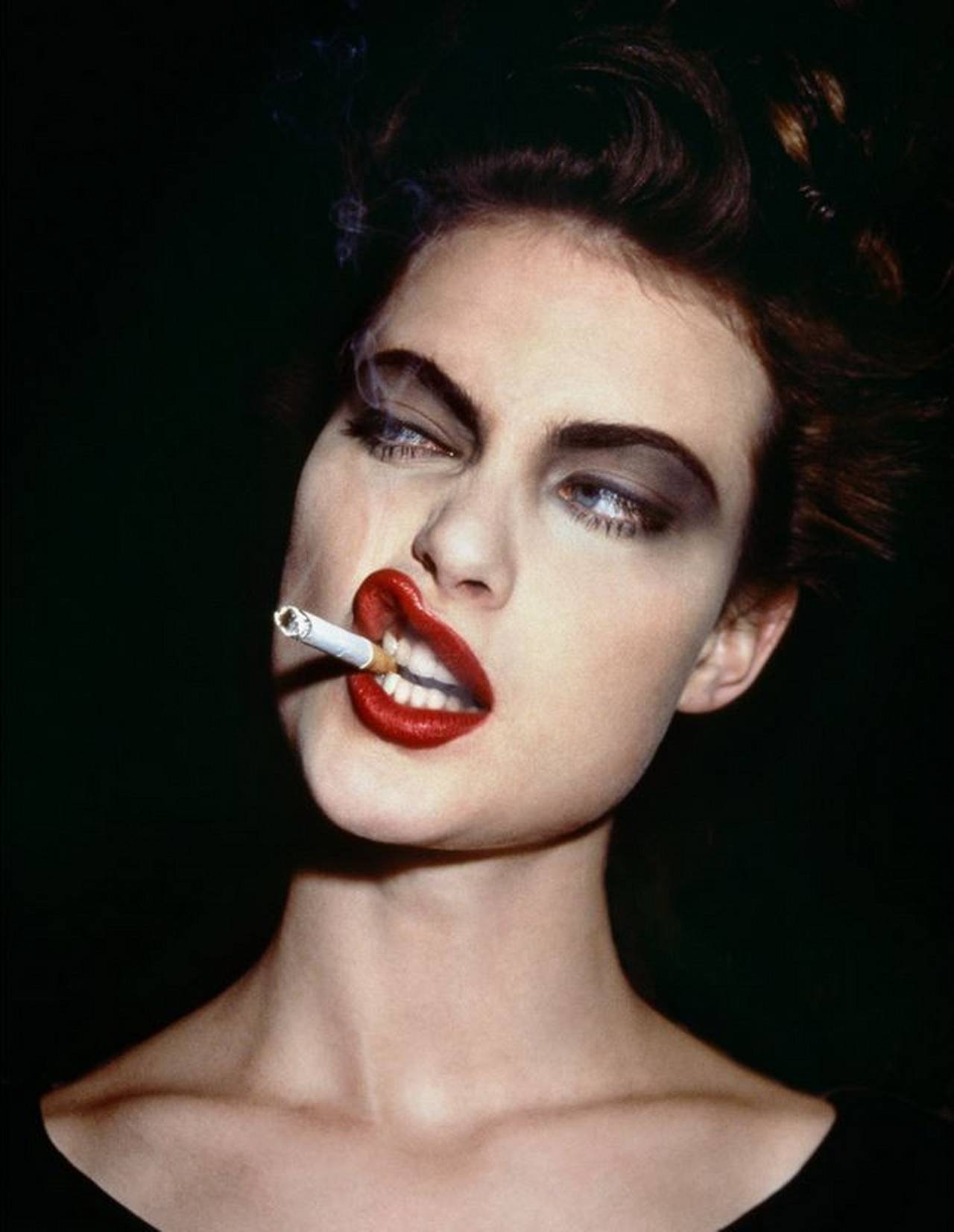 Roxanne Lowit Portrait Photograph - Shalom Harlow - portrait of the model smoking, fine art photography, 1995