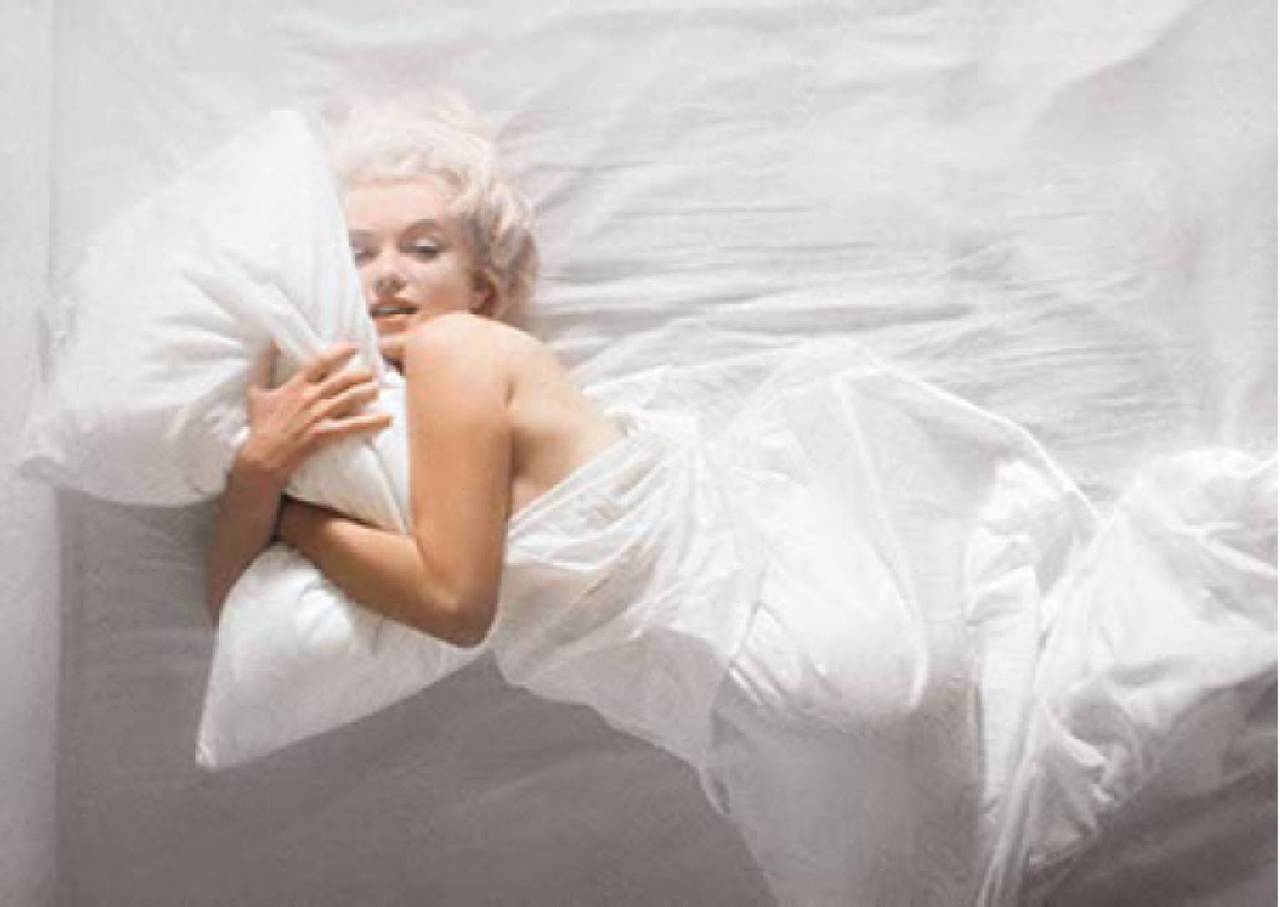 Douglas Kirkland Nude Photograph - Marilyn Monroe I - rolling between white sheets, fine art photography, 1961