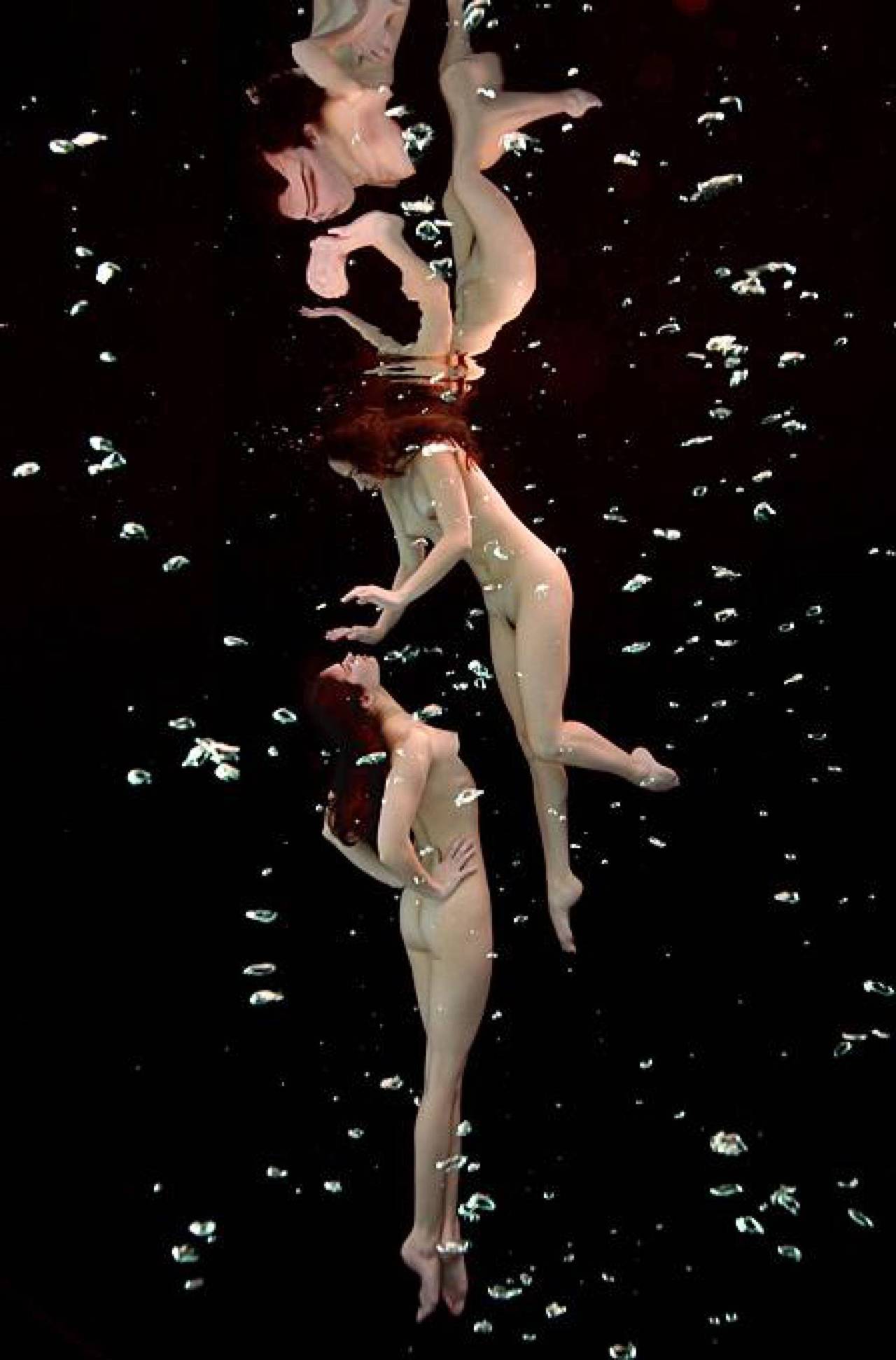 Howard Schatz Color Photograph - Underwater Study # 2517 - nude portrait of two models floating underwater