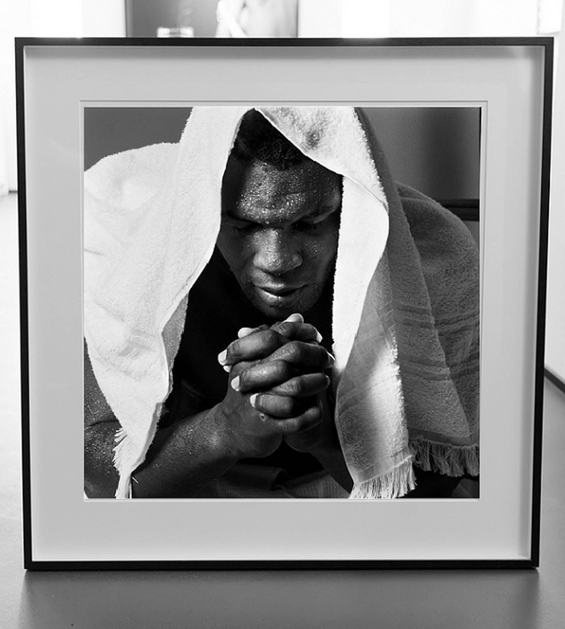 Mike Tyson Training Camp - Portrait with towel, fine art photography, 1990 - Photograph by Michel Comte