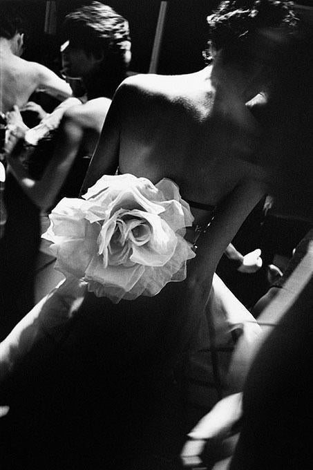 Gérard Uféras Black and White Photograph - Gianfranco Ferre Pret a Porter; MIlan, woman's back with flower on her dress