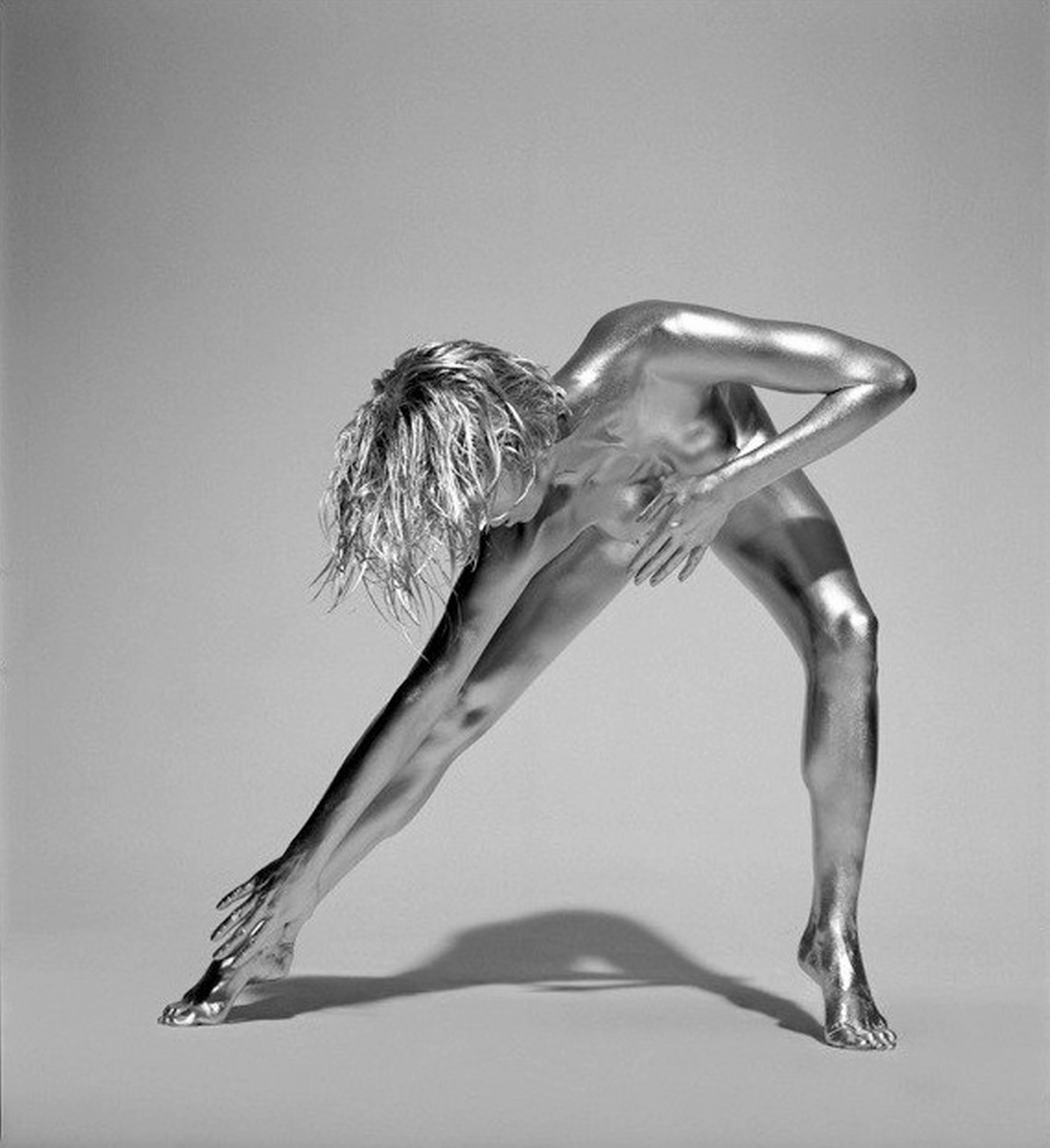 Amaterasu - naked model covered in silver paint - Photograph by Guido Argentini