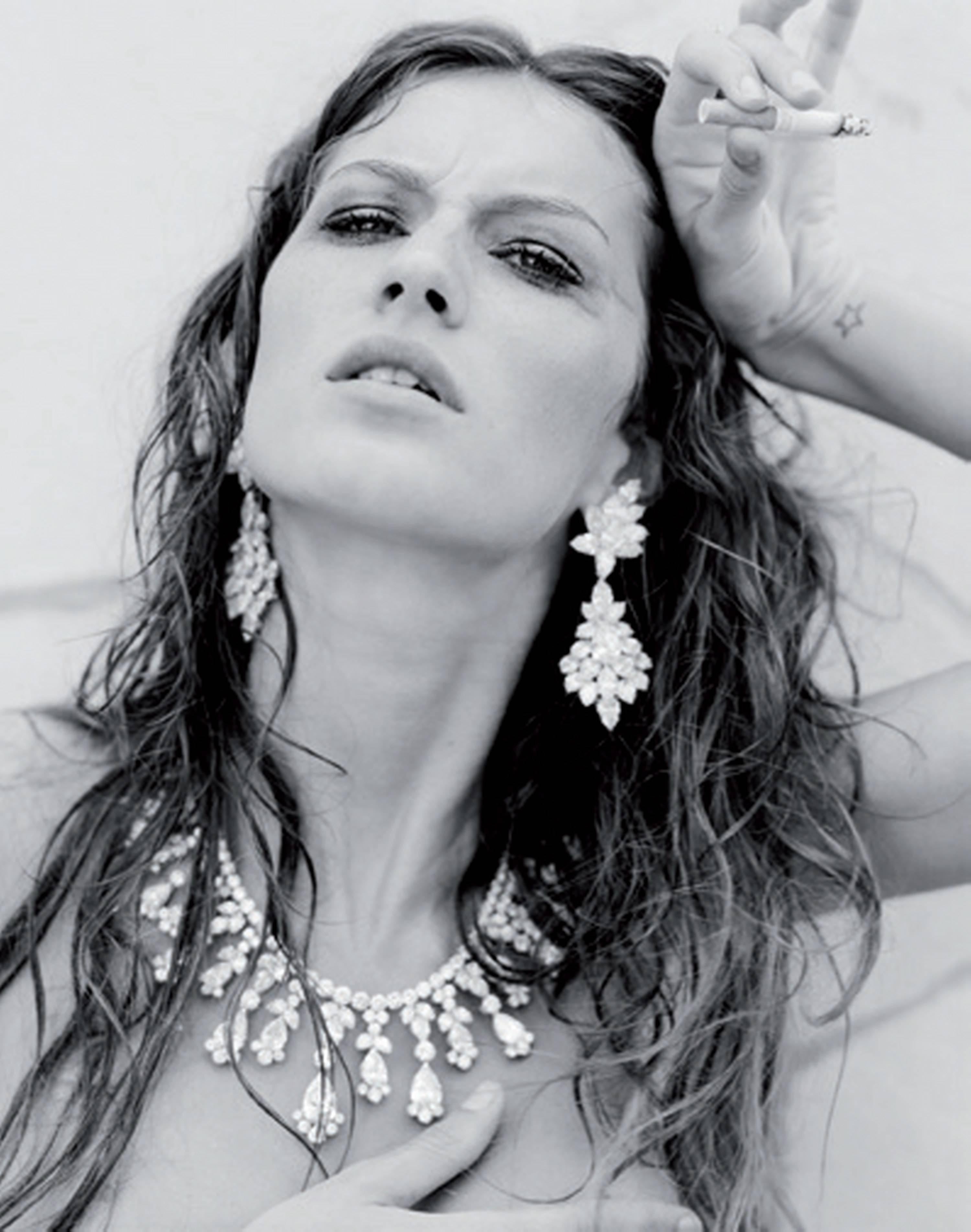 Gisele Buendchen, Cannes - the supermodel naked  in jewelry with a cigarette - Photograph by Michel Comte