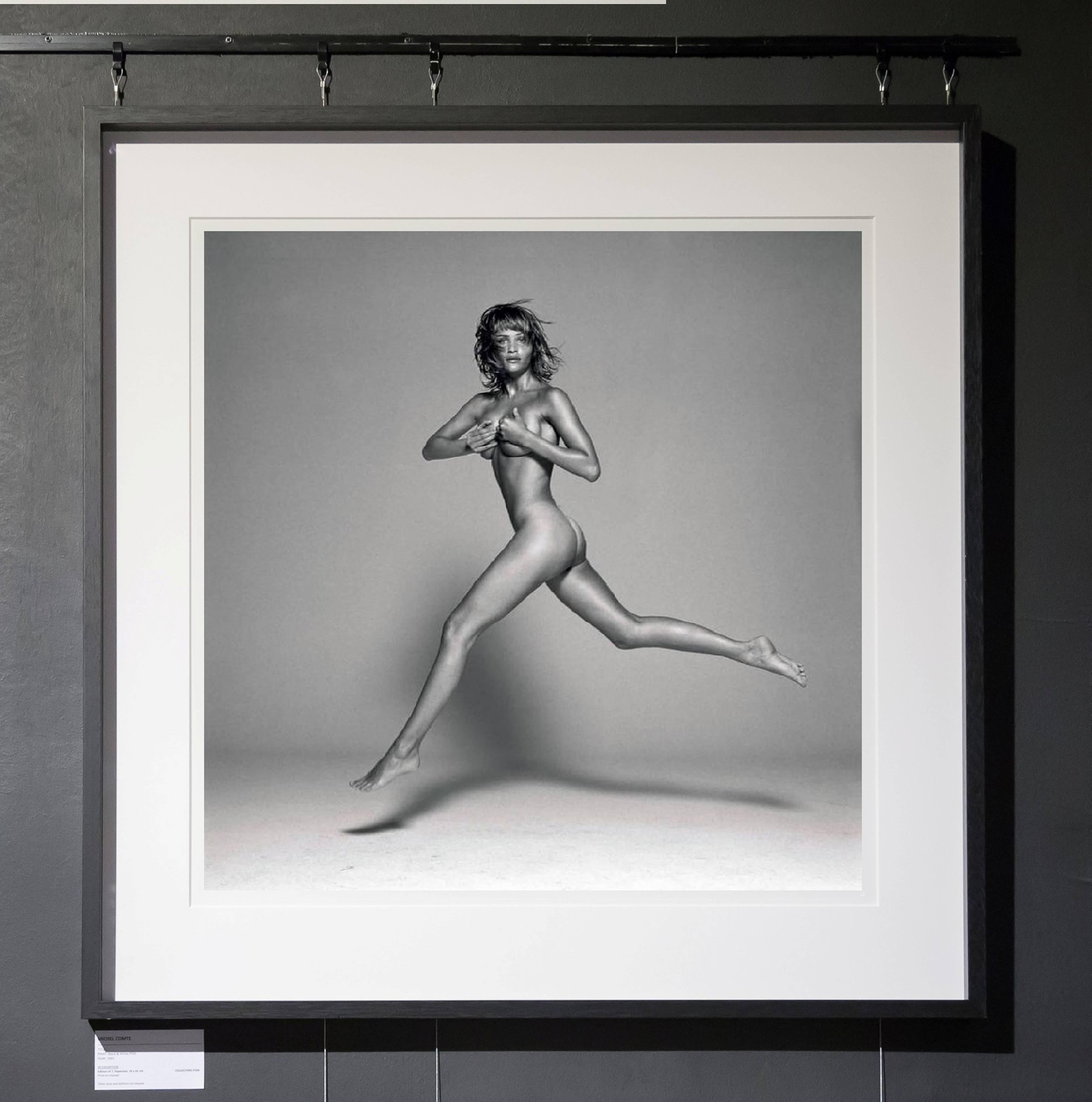 Helena Christensen II - the nude supermodel jumping in the air  - Photograph by Michel Comte