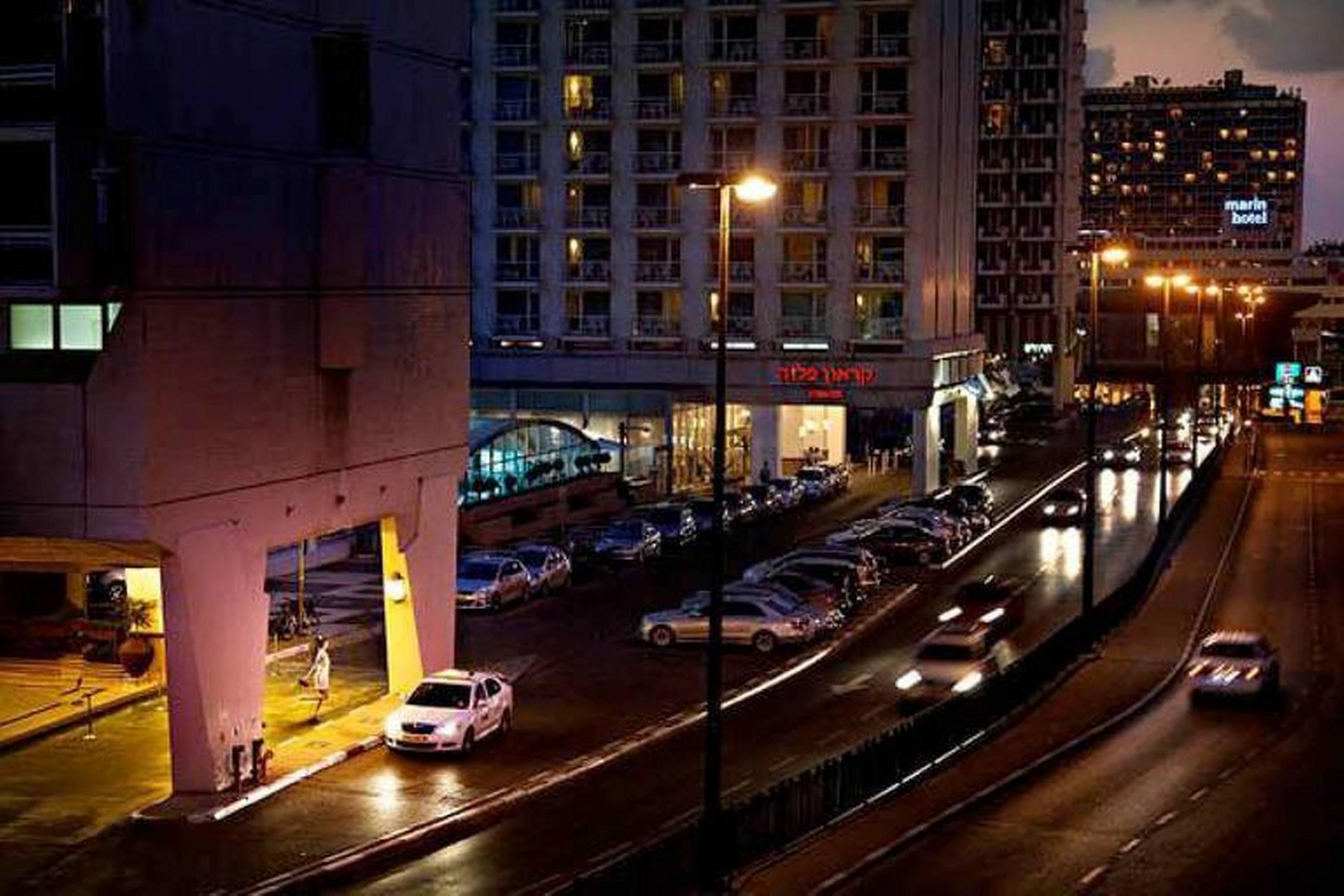 David Drebin Color Photograph - Heels in Tel Aviv