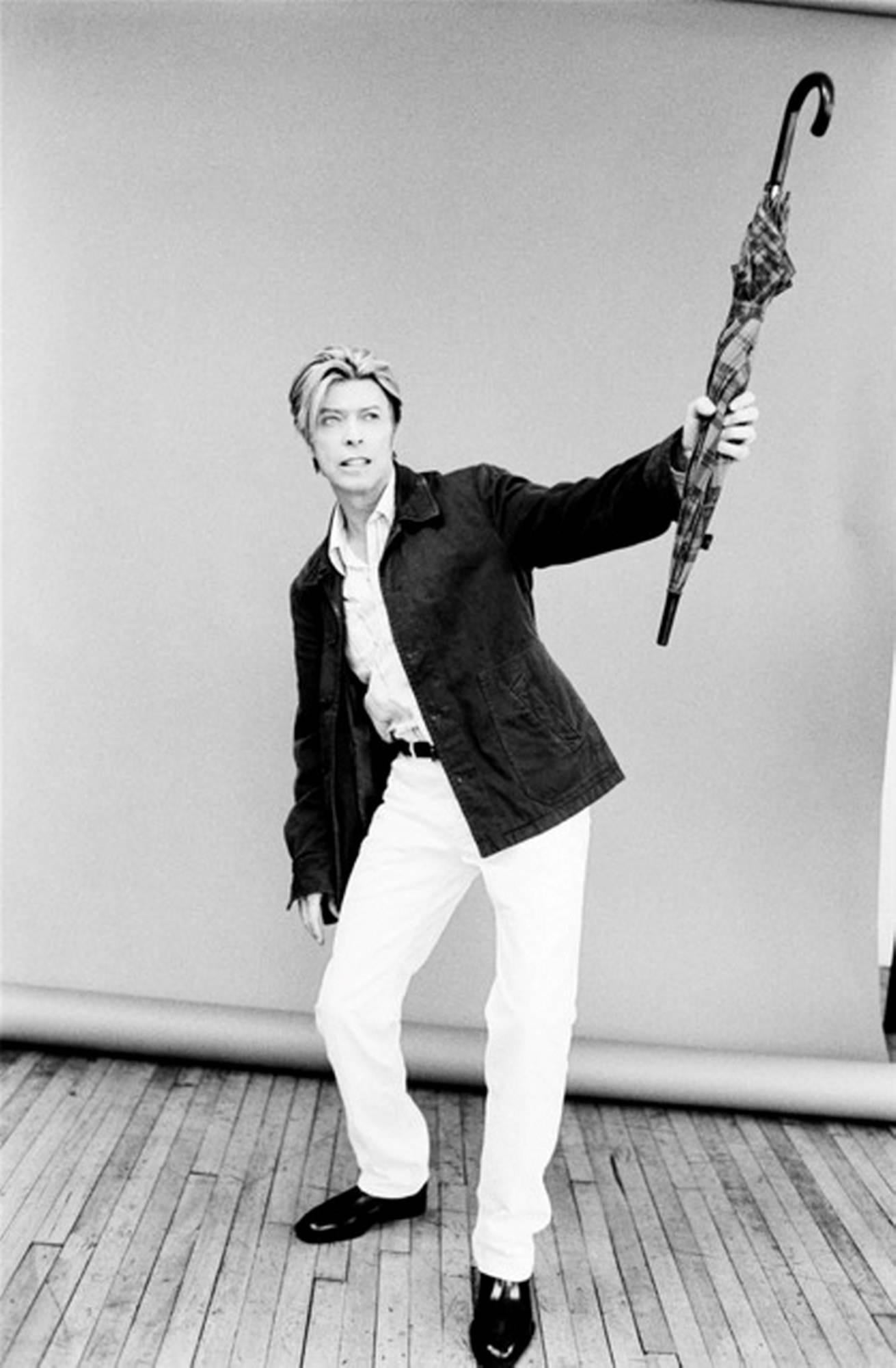 Ellen von Unwerth Black and White Photograph - David Bowie with Umbrella