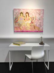 Sisters, Two Women in Patterned Shirts on Floral Print Couch, Pink Background