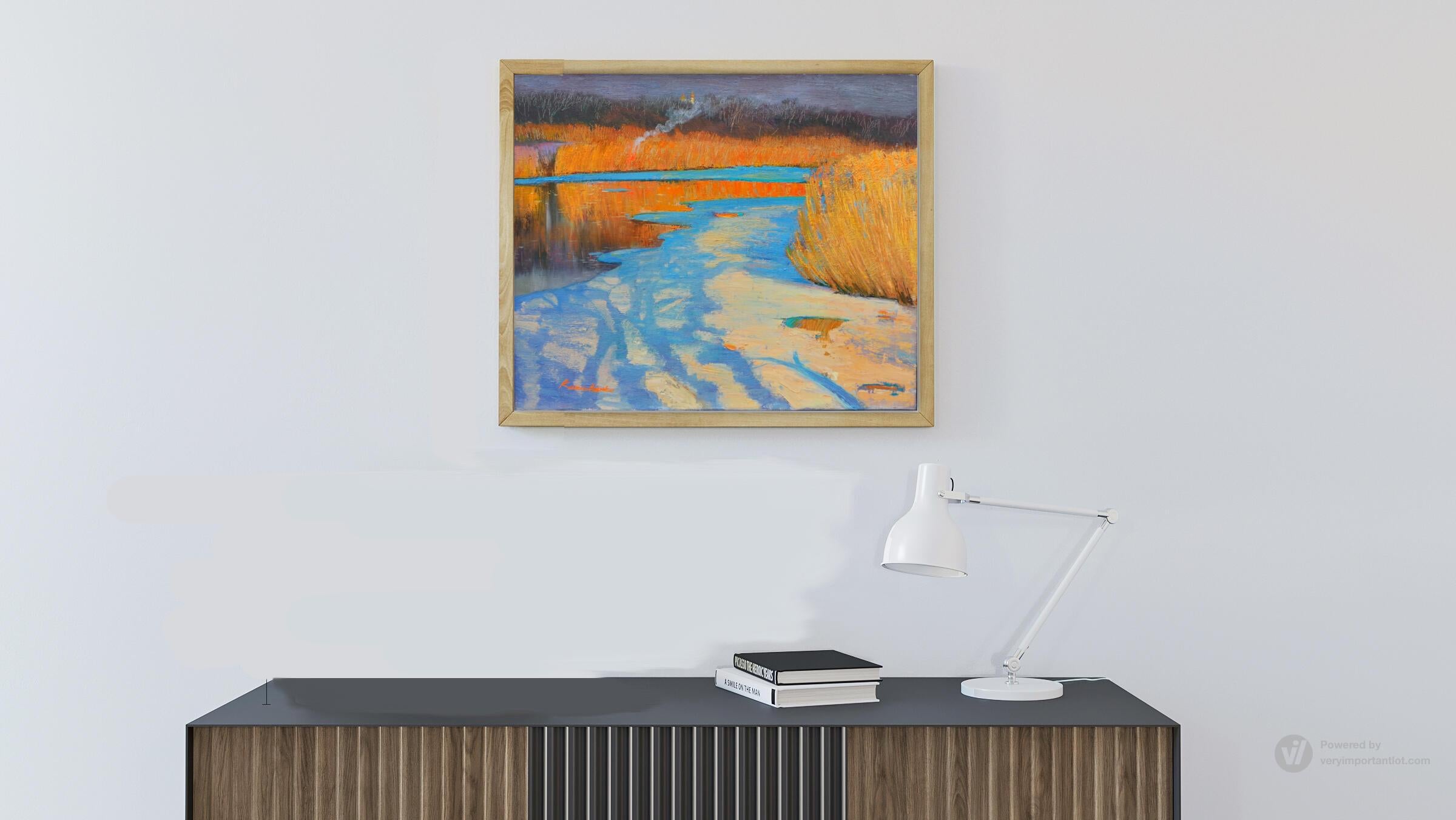 The beauty of the sunset landscape is always fascinating. Early spring, thawed patches on the ice and the remains of snow. The air is calm, completely calm. The sun goes down beyond the horizon, illuminating everything around with bright colors,