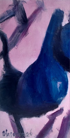 "Three black garlic cloves on a pink background"