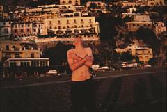 Pawel on the beach laughing, Positano, Italy