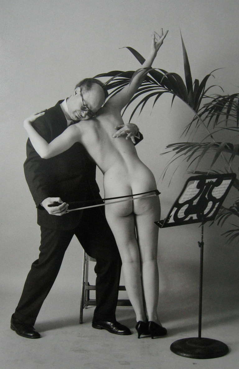 Alfred Gescheidt Black and White Photograph - Man Playing his Favorite Instrument