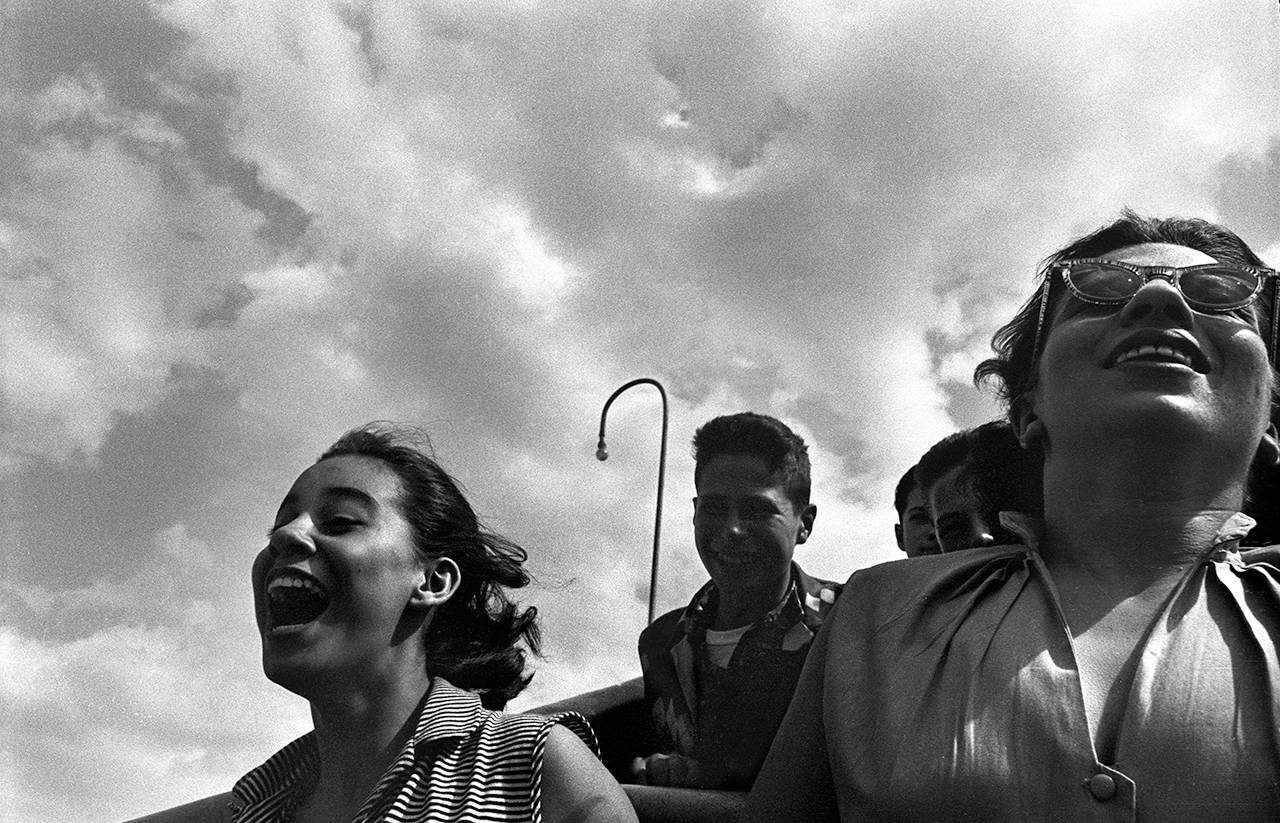Harold Feinstein Black and White Photograph - Girl on Cyclone II