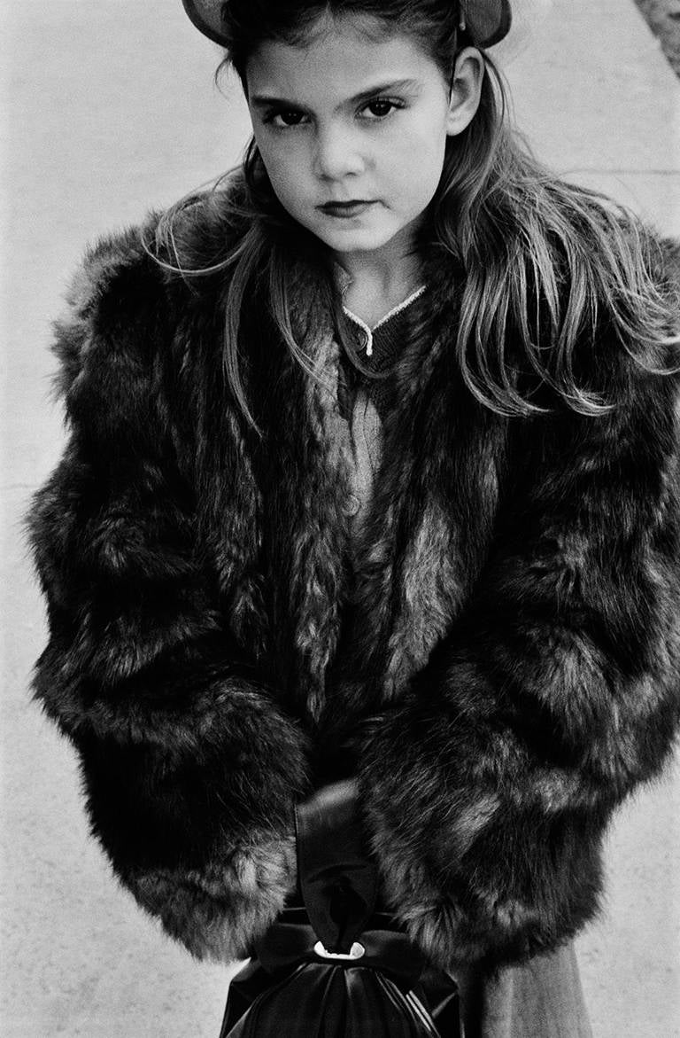Harold Feinstein Portrait Photograph - Young Girl Wearing Fur Coat, NYC