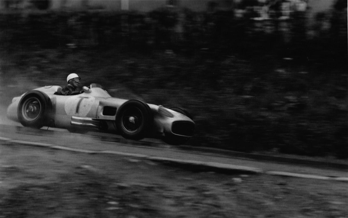 Jesse Alexander Black and White Photograph - Stirling Moss, Spa-Francorchamps, Grand Prix of Belgium, June