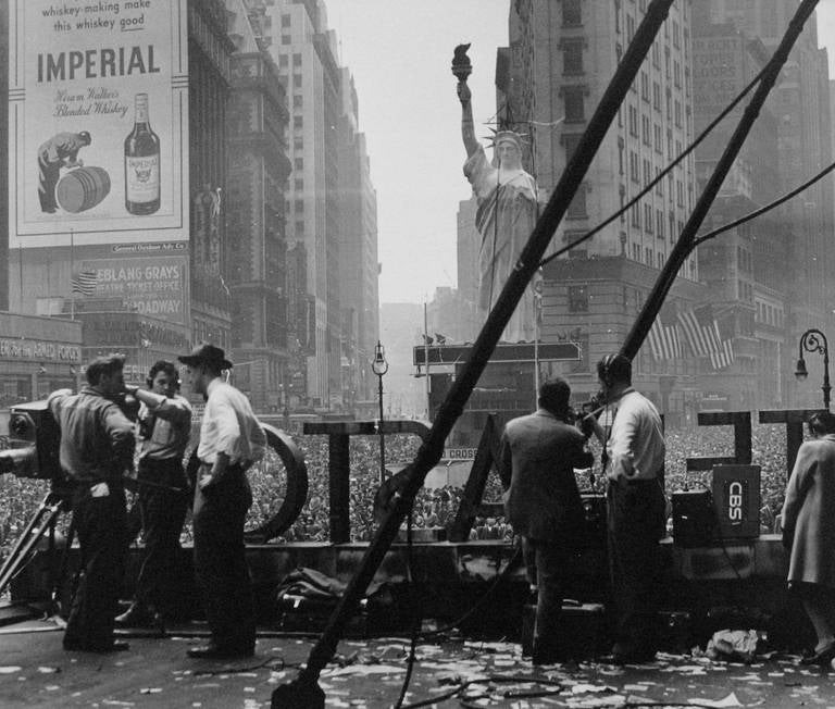 Ruth Orkin Black and White Photograph - VE Day Times Square, 1945