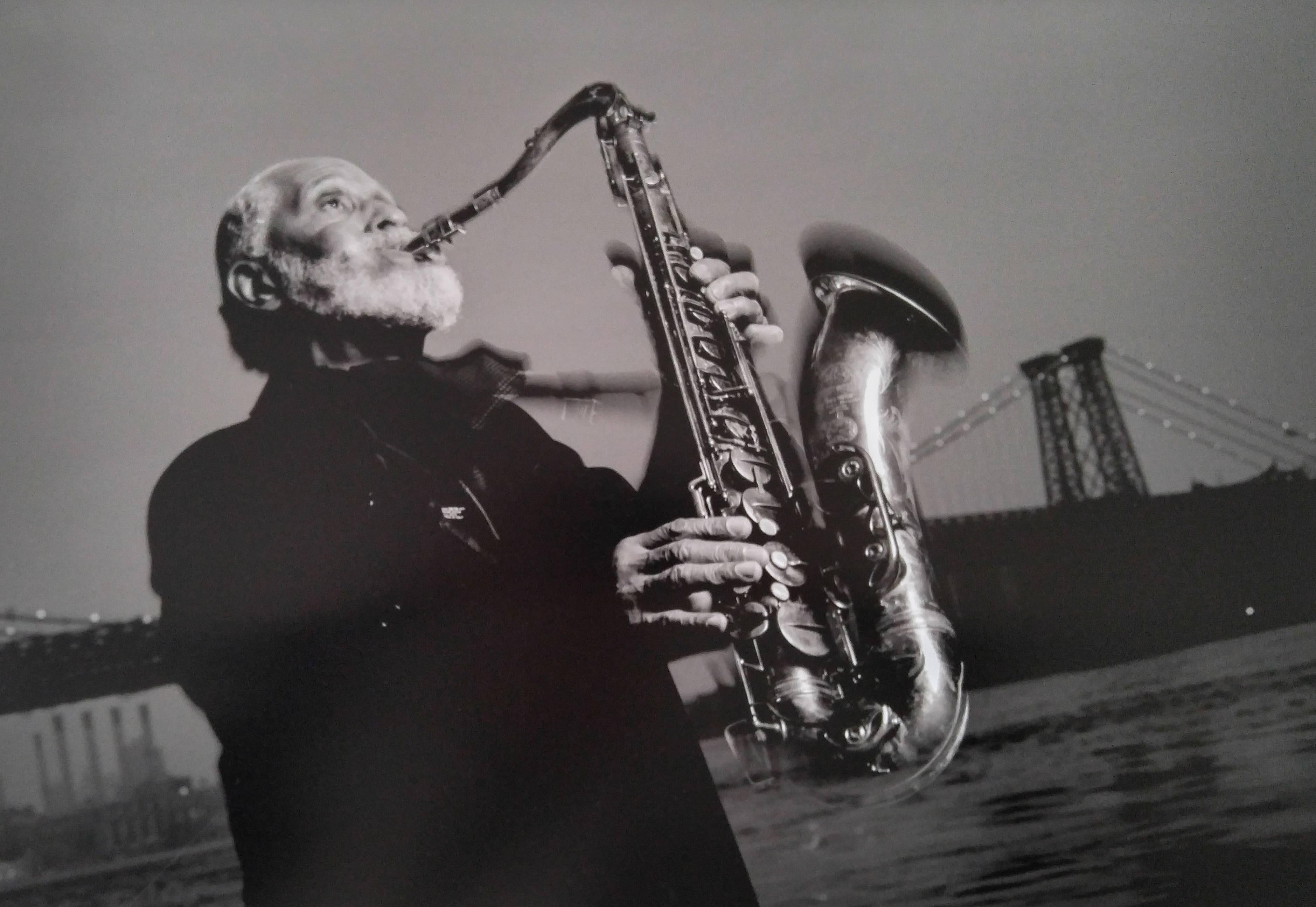Jimmy & Dena Katz Black and White Photograph - Sonny Rollins, Williamsburg Bridge, NYC; From Jazz Katz: The Sounds of New York