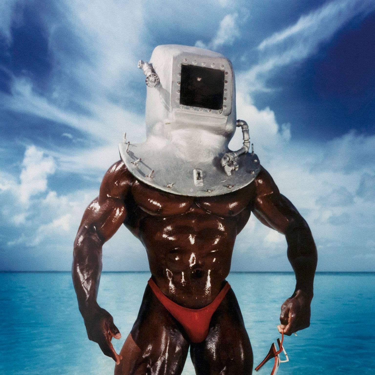 Man With Diving Bell - Gray Color Photograph by David LaChapelle