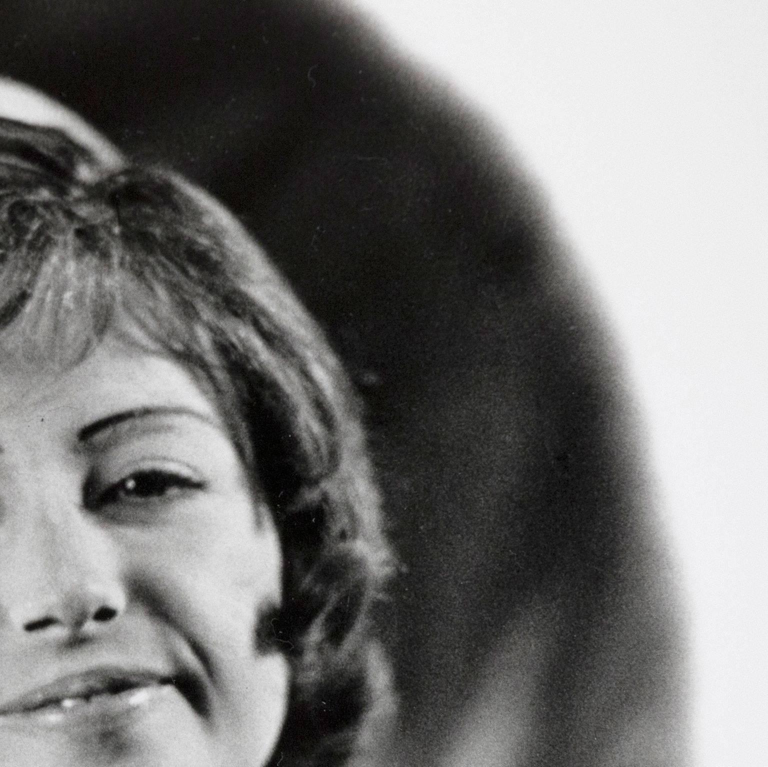 Seller specializes in Cindy Sherman multiples. 

Throughout her illustrious and dynamic career, Cindy Sherman has impersonated a vast number of female characters ranging from weary bus passengers to haughty society ladies.

There is an inherent