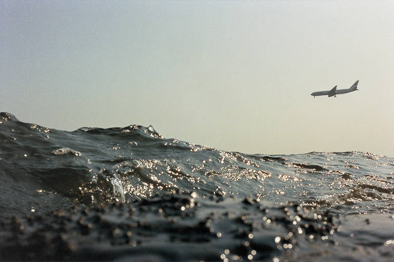 Asako Narahashi's series "half awake and half asleep in the water" is a collection of C-Prints of various coastal sites in Japan. Since beginning the project in 2001, the artist has photographed over fifty locations with a Nikonos 35mm waterproof