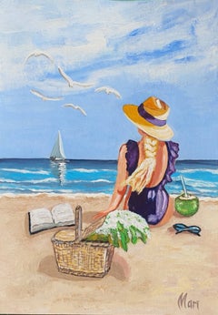 Femme au chapeau de paille sur la plage, en train de pique-niquer