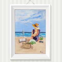 Woman in Straw Hat on Beach with Picnic