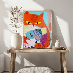 Gato naranja con un pez de colores