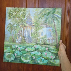 Thai Temple with Lotus Pond and Palm Trees