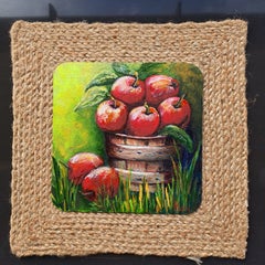 Red Apples in Rustic Wooden Basket with Green Leaves