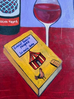 Composición con un libro y una enredadera