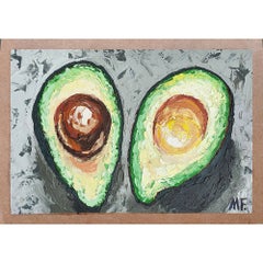 Avocado Still Life with Two Halves on Textured Gray Background