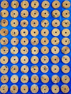 Mixed media cork ring composition by Mystery Artist