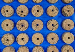 Mixed media cork ring composition by Mystery Artist