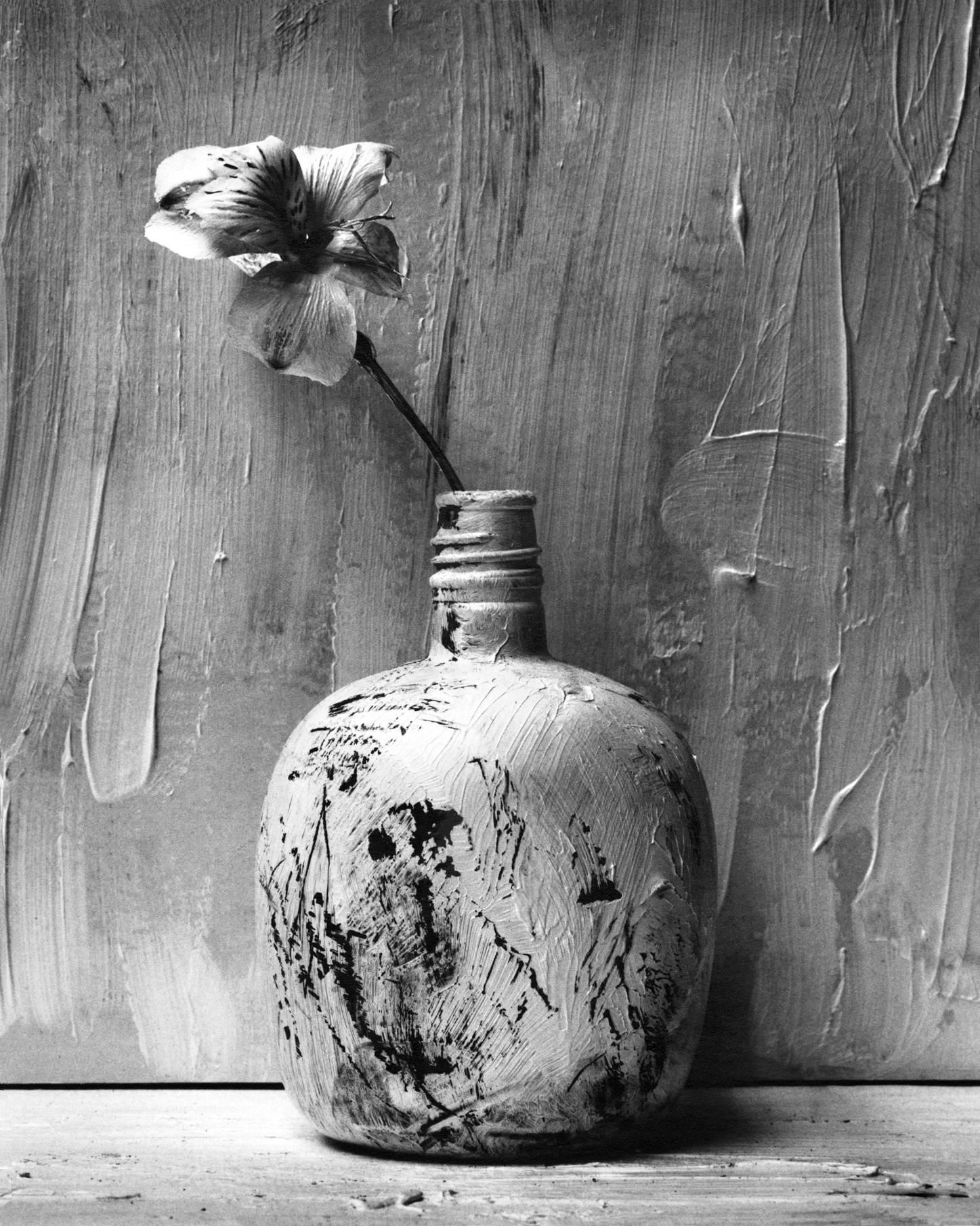 Alexandra Catiere Still-Life Print - Black and white Still life photography, Picture of Painted Bottle with Flower