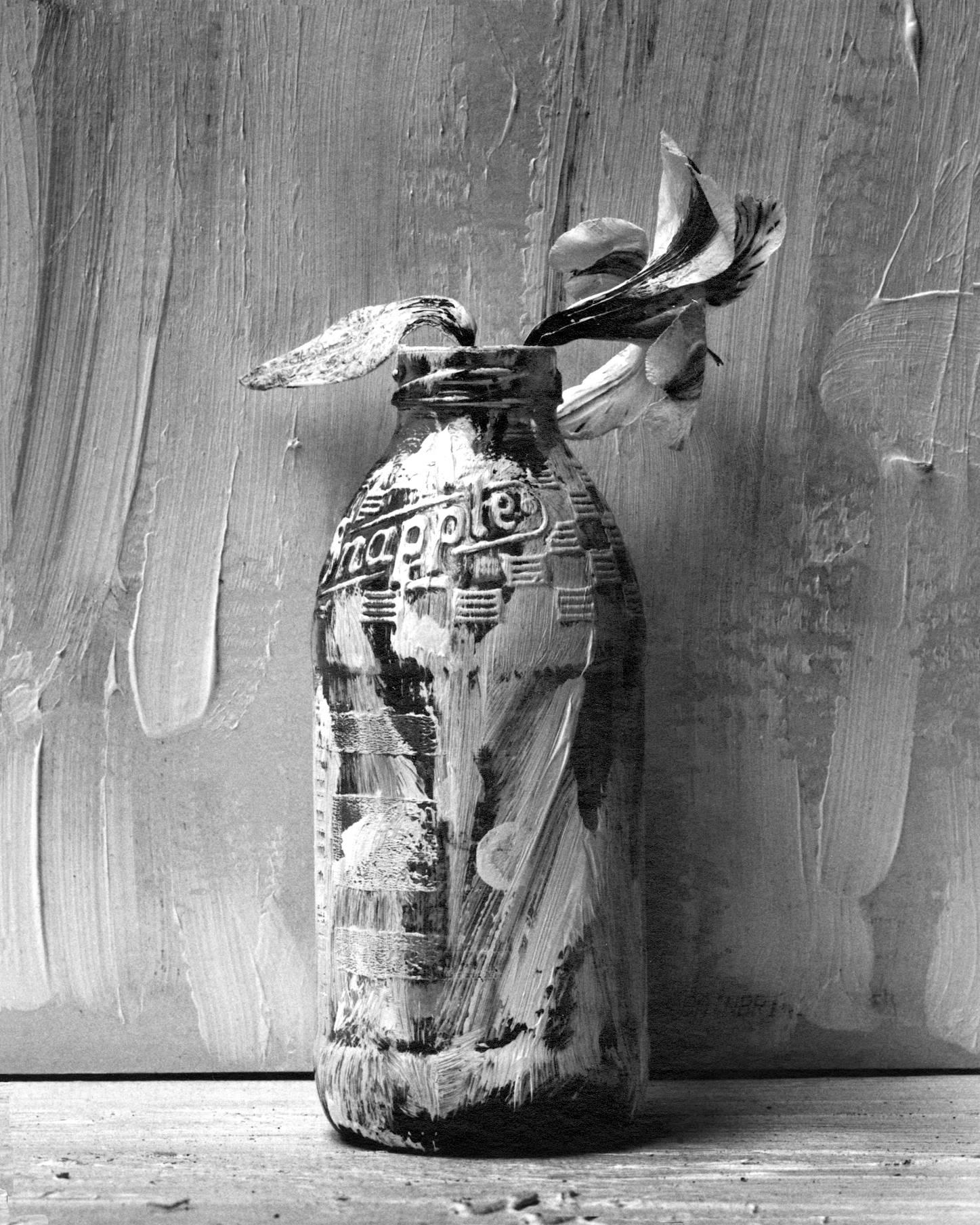Alexandra Catiere Black and White Photograph - Picture of Painted Bottle with Flower, Black and white Still life photography