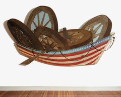 Row Boat (Mixed Media Wooden Wall Sculpture of Wagon Wheels & American Flag)
