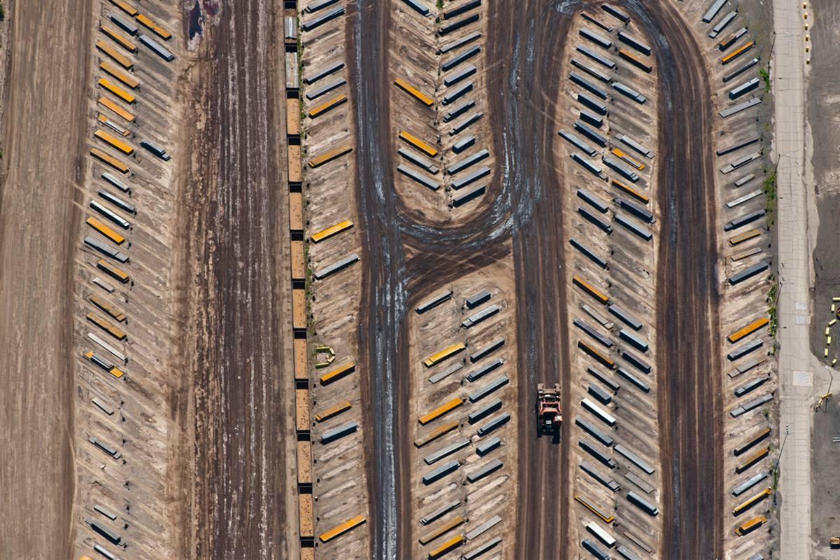 Field of Large Steel Plates and Large Loader (Aerial Industrial Photograph)