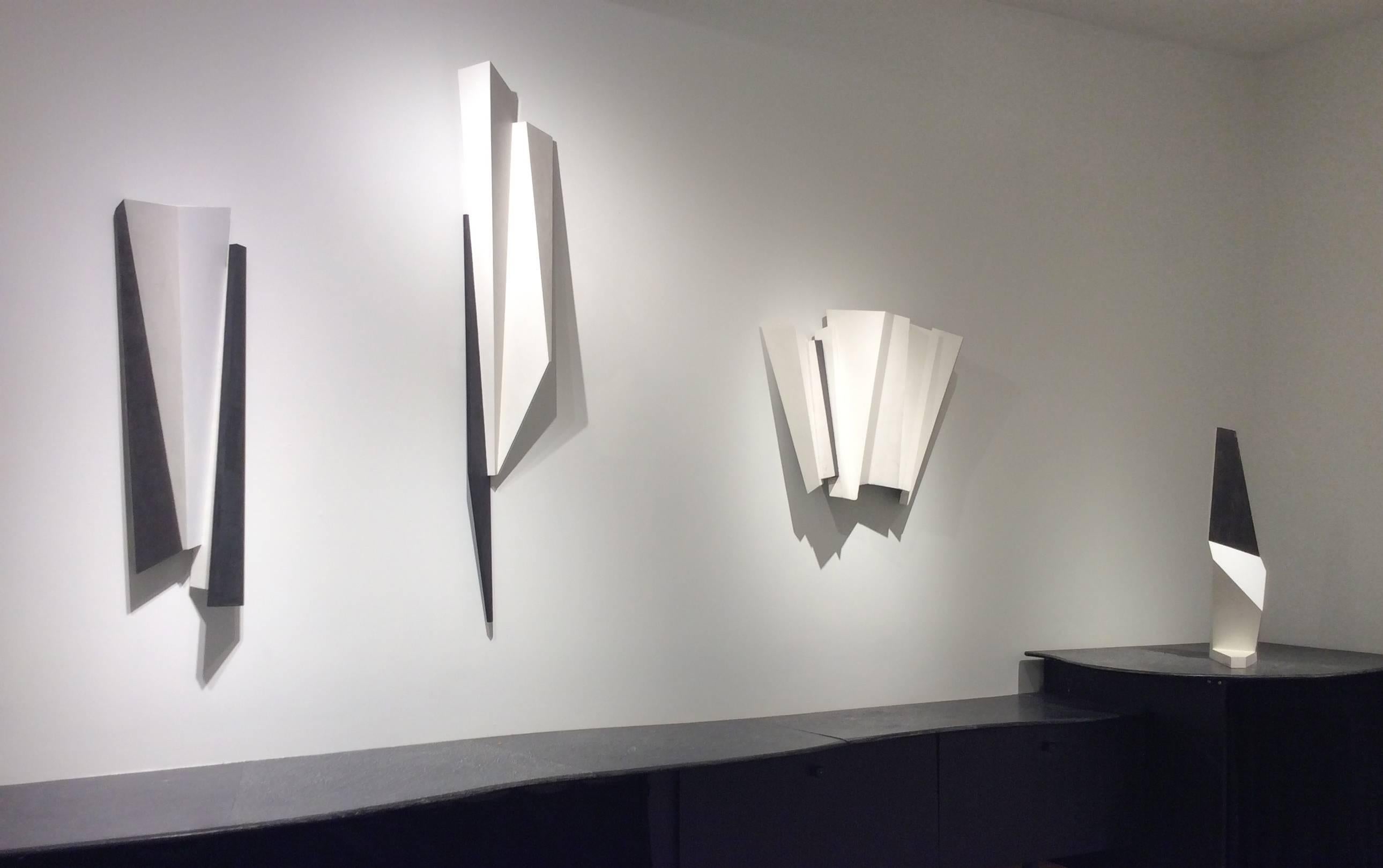 32 x 12 x 6.5
carved precision board & Venetian plaster 

This contemporary, abstract minimalist wall sculpture was made by Japanese artist, Dai Ban in 2017. The elegant minimalist wall sculpture is incredibly lightweight and has a thin surface