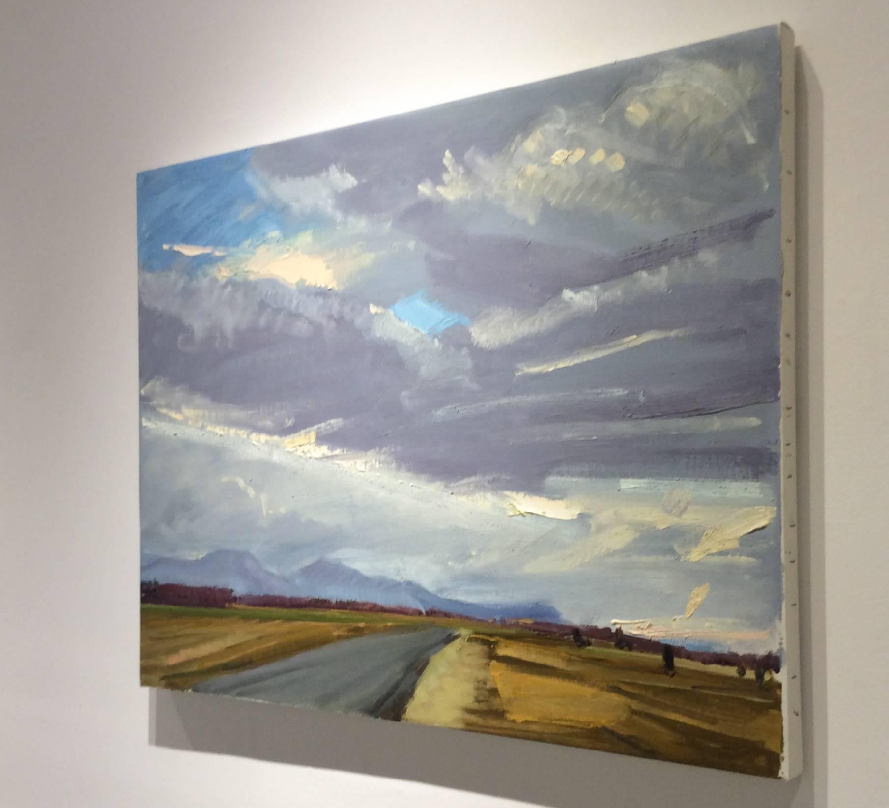 Hudson Valley landscape painting of country road with Catskill Mountains and expansive blue sky. 
Oil on linen, 26.5 x 34 inches

John Kelly approaches the Hudson Valley landscape with the eye of an architect and the hand of an impressionist. With