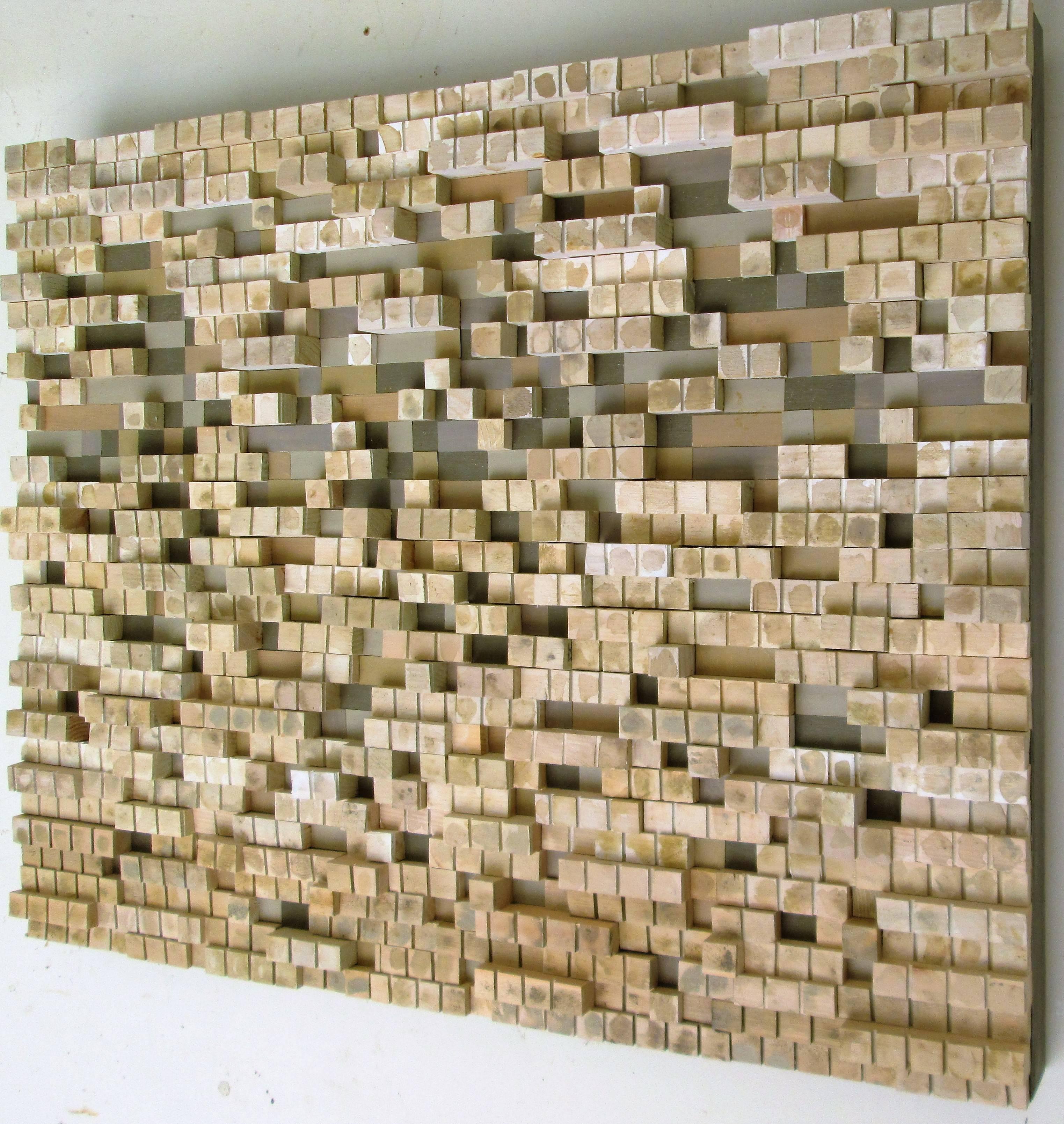 Abstract geometric three dimensional wood wall sculpture in earth toned shades of beige, light brown, and tan
“Migration” by Hudson Valley artist, Stephen Walling, made in 2015
Hand carved wood with acrylic paint on panel  
24 x 30 x 2 inches  
Wire