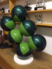 On the Verge (Mid Century Modern Inspired Stacked Balancing Balls in Dark Green)