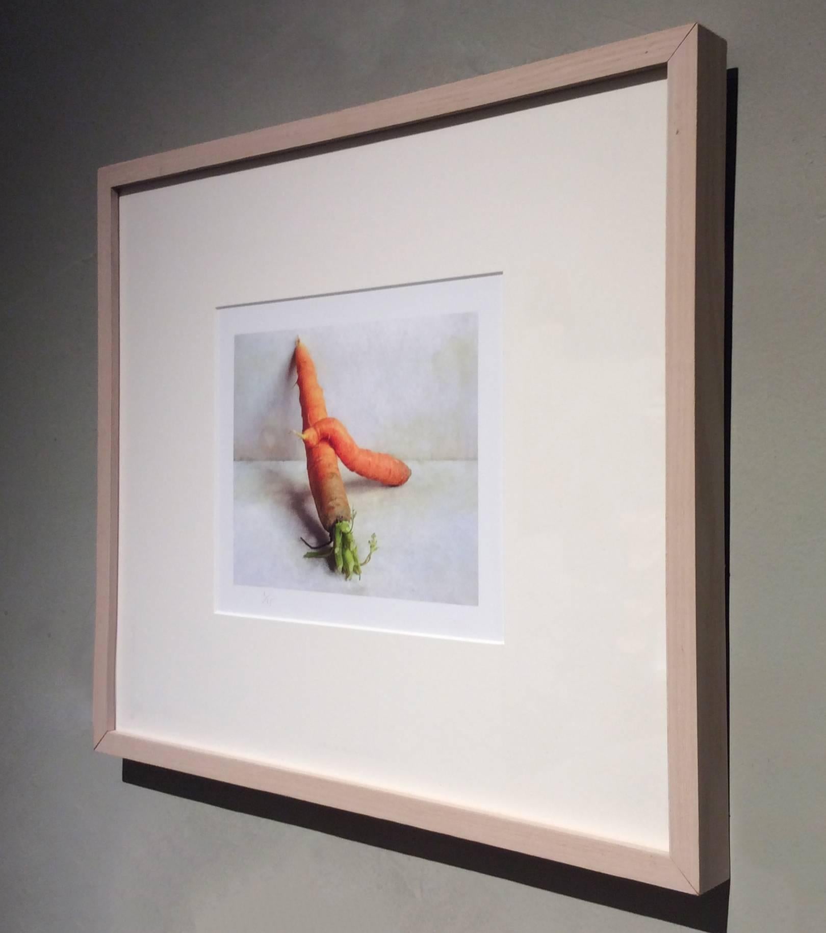 archival pigment print
16 x 19 in simple wood frame with white mat

This archival pigment print of two oranges resting on a textured white surface was created by photographer David Halliday. As with all of his culinary-themed still lifes, Halliday