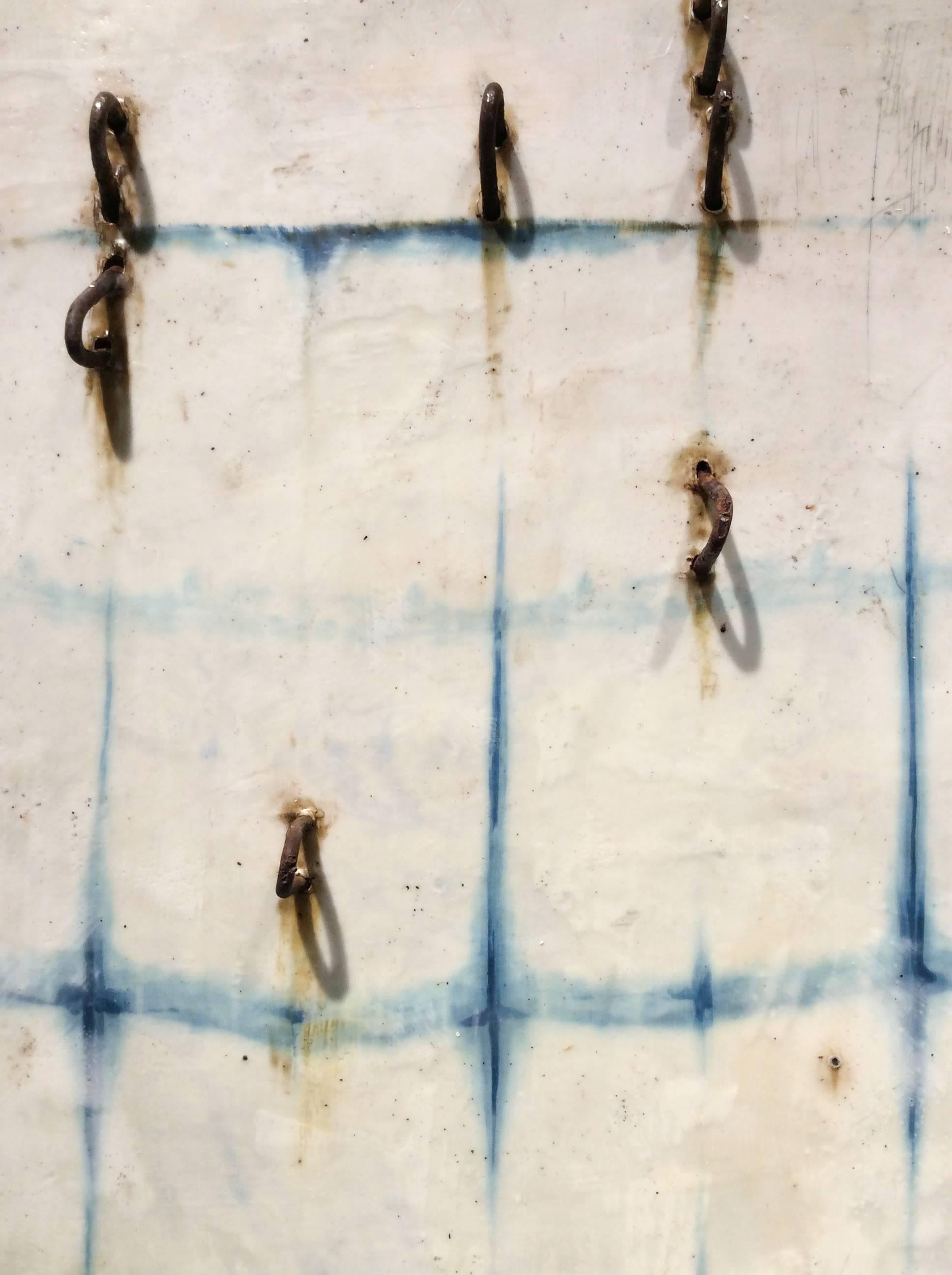 Hand dyed indigo fabric, wax, metal, and thread on panel
33.5 x 35 x 3 inches

This contemporary pattern-based abstract silk and encaustic work on panel was created by San Francisco-based artist Susan Stover as part of her Indigo series, so-named