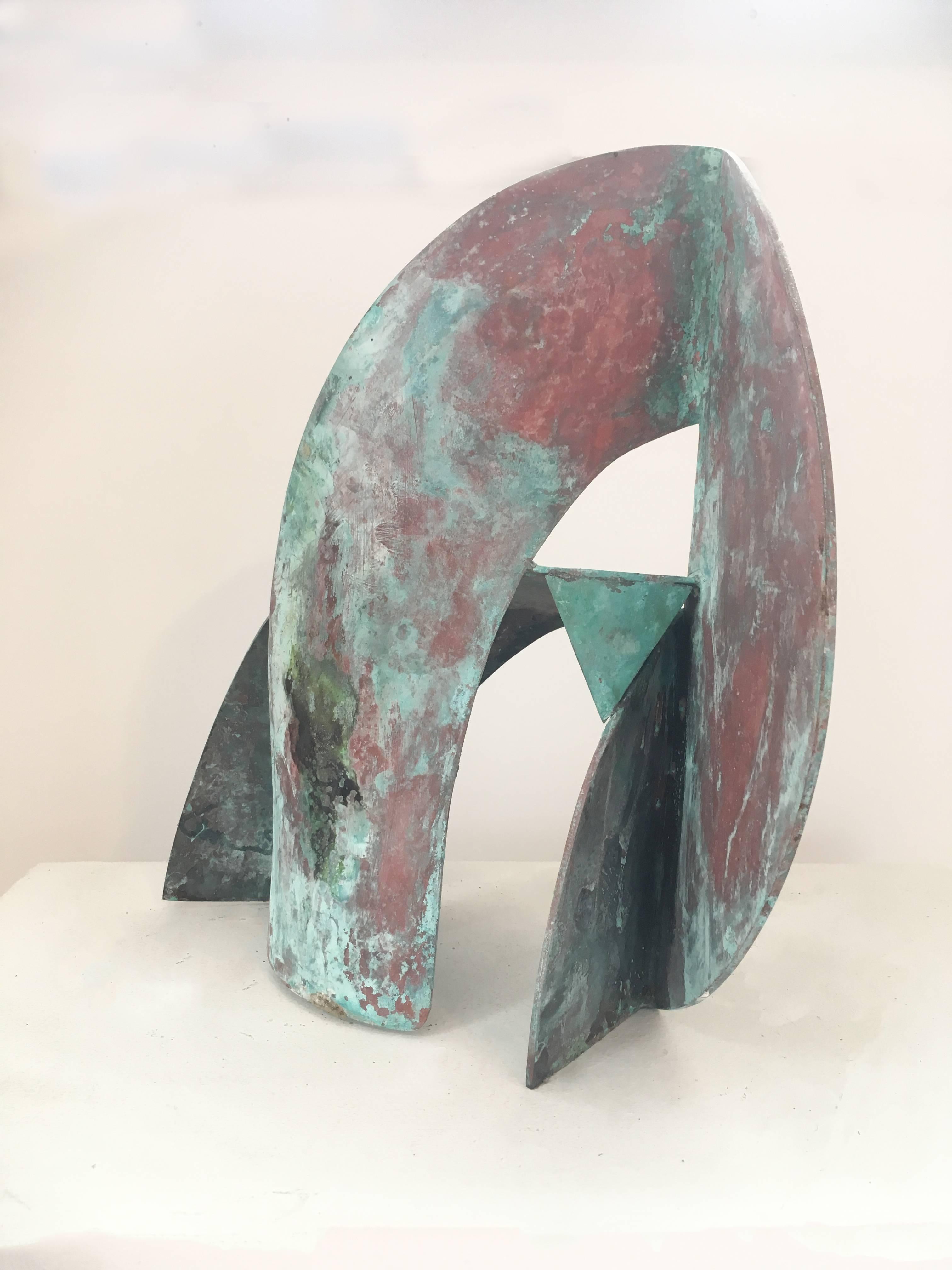 Small abstract sculpture in teal patinated brass, mid century modern style 
13 x 12 x 7 inches
patinated brass 

This small, contemporary abstract sculpture made of patinated brass is perfectly suited for a tabletop, pedestal, or mantle piece.