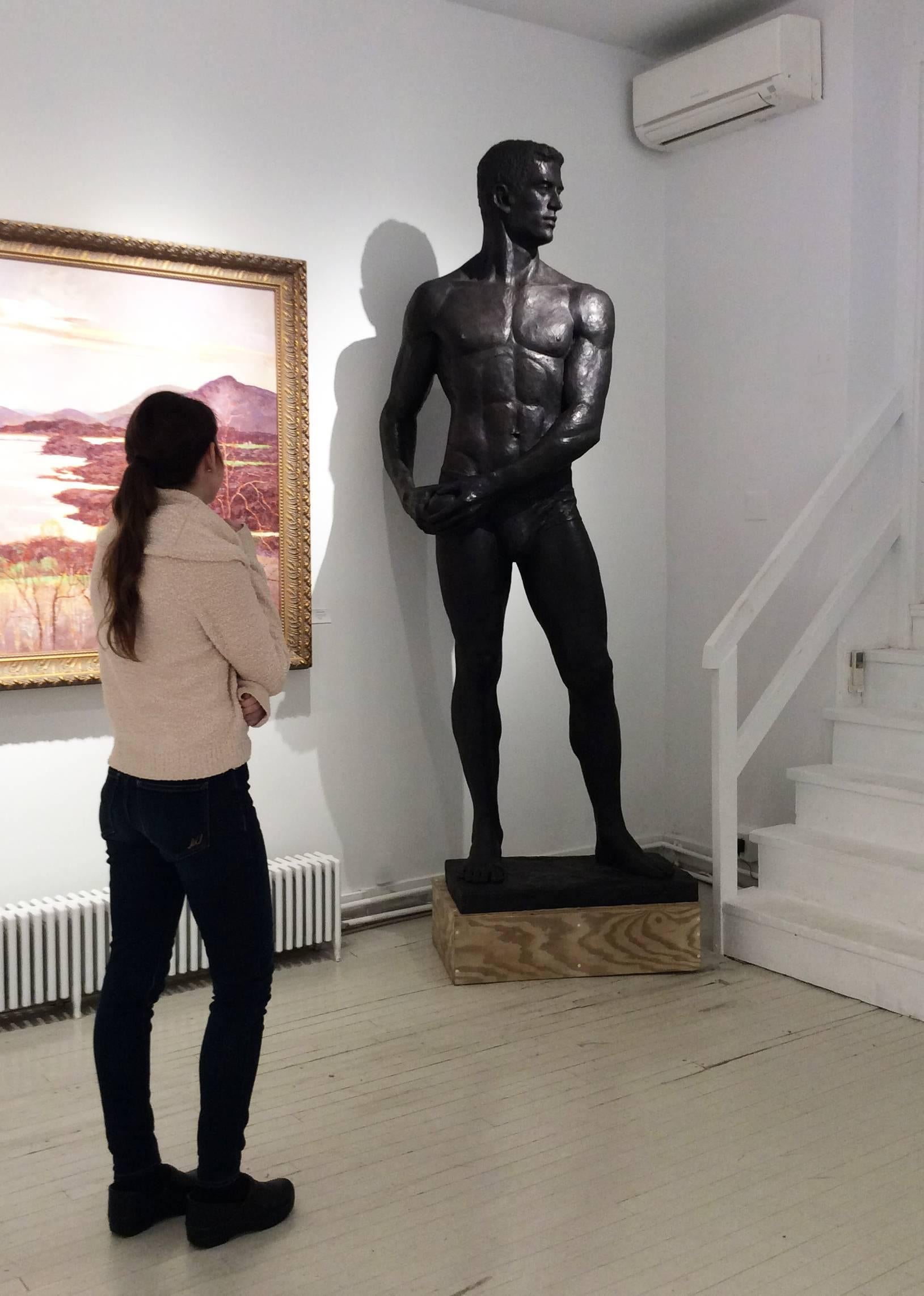 modern figurative bronze sculpture of a nude athlete 
8.5 feet tall and measures 36 inches at the widest point
bottom base measures 31.5 x 17.5 inches
This sculpture is offered by Carrie Haddad Gallery, located in Hudson, NY.

This figurative bronze