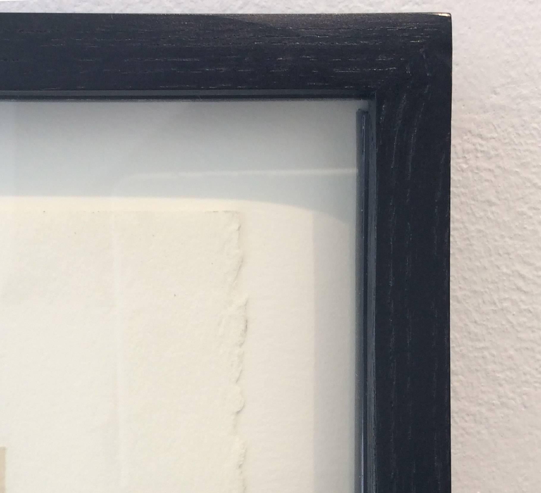 unique contemporary collage of fabric, paper and ribbon on Archival paper.
Artwork measures 30 x 22 inches.
Paper is floated without a mat in a painted black wooden frame, measuring 32.75 x 25 inches.
