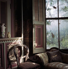 9 Wellington Street: Dennis' bedroom - small chair and vine covered window