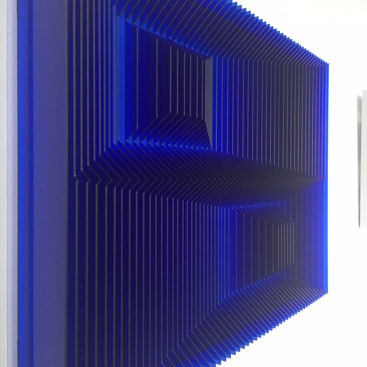 Cross perspectives Blue - kinetic wall sculpture by J. Margulis - Print by Jose Margulis