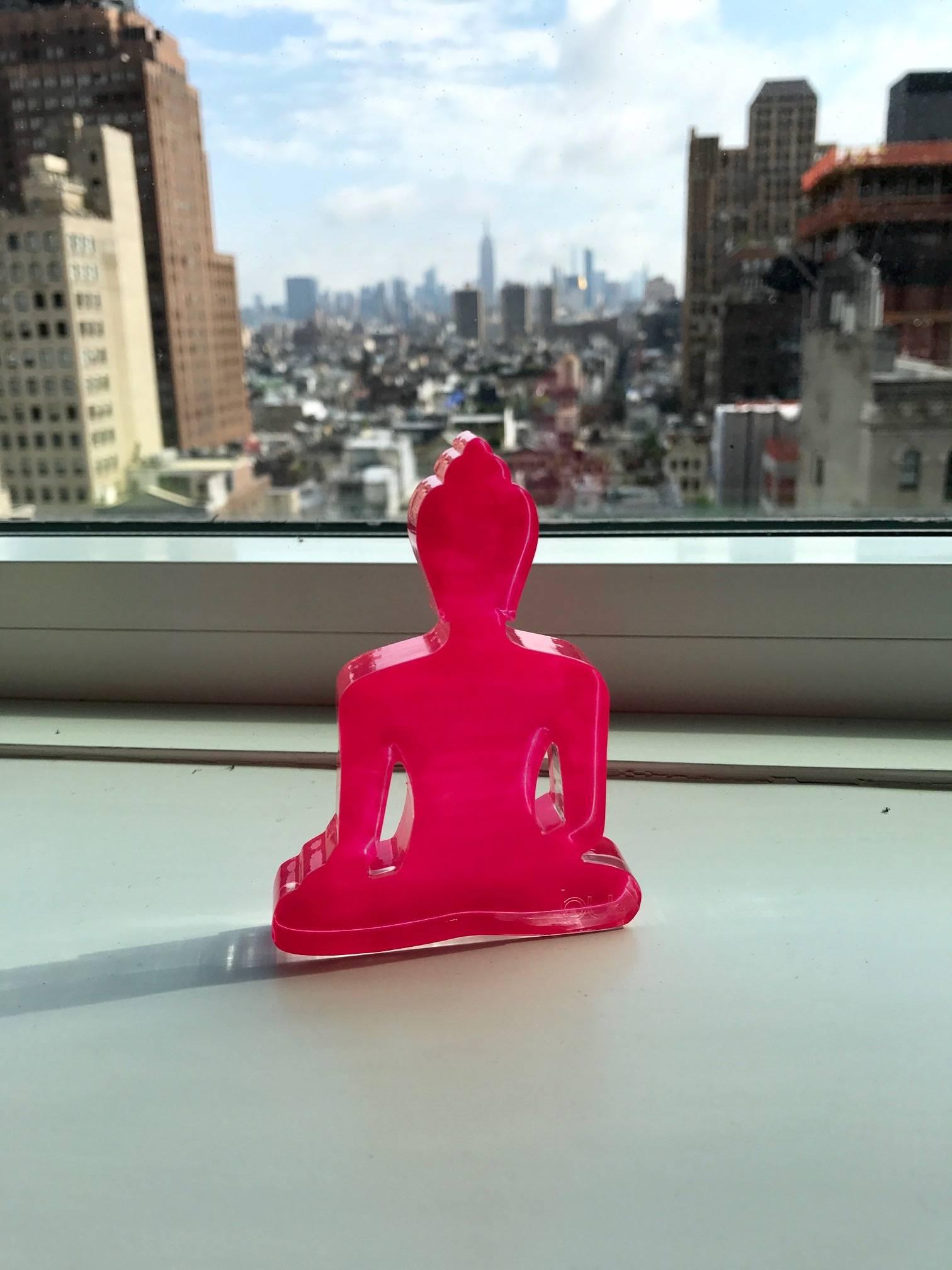 pink buddha statue